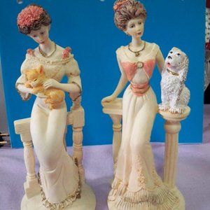 2 beautiful victorian ladies with their pets. Apprximately 8 1/2 inches tall.